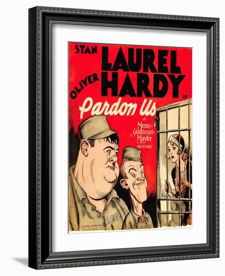 PARDON US, from left: Oliver Hardy, Stan Laurel on window card, 1931.-null-Framed Art Print