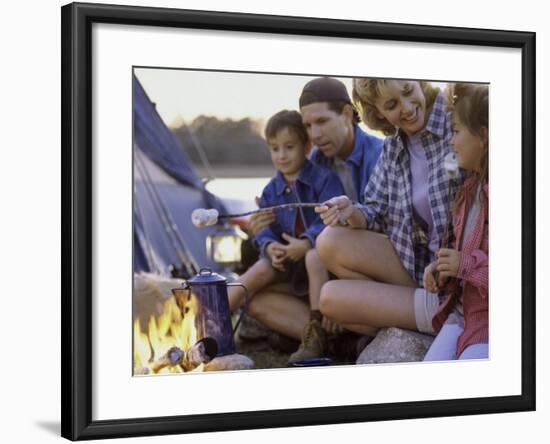 Parents And Their Children Sitting Around a Campfire Toasting Marshmallows-null-Framed Photographic Print