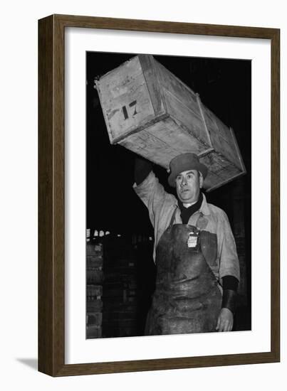 Paris Porter Wearing a Special Hard-Crowned Hat to Carry a Fish Crate, 1946-null-Framed Photo