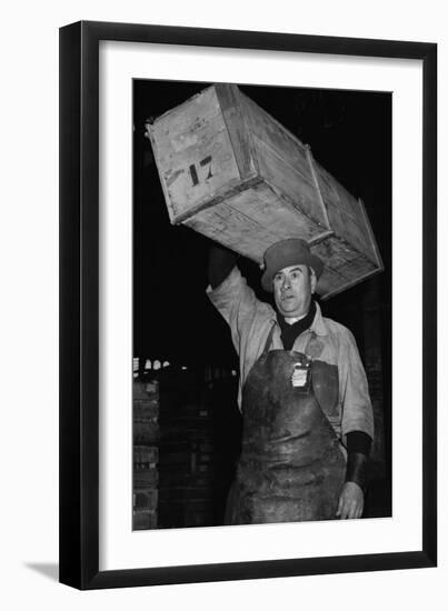 Paris Porter Wearing a Special Hard-Crowned Hat to Carry a Fish Crate, 1946-null-Framed Photo