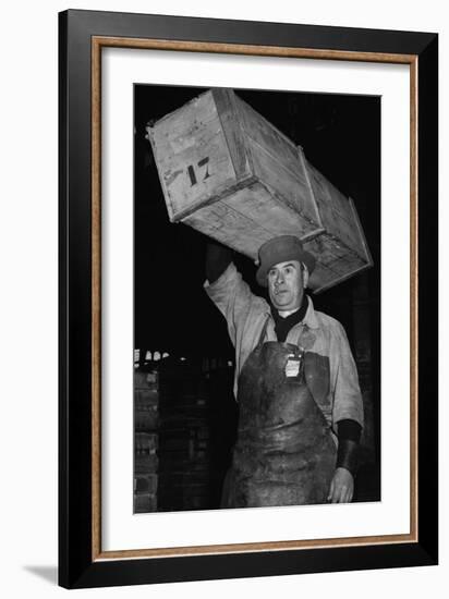 Paris Porter Wearing a Special Hard-Crowned Hat to Carry a Fish Crate, 1946-null-Framed Photo