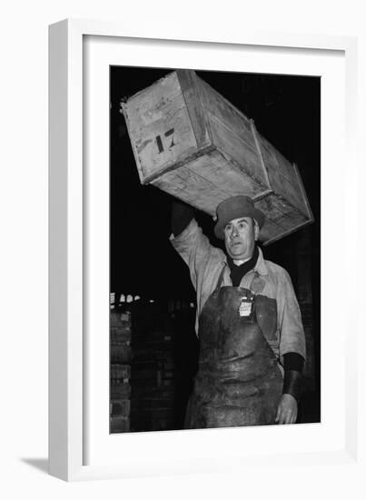 Paris Porter Wearing a Special Hard-Crowned Hat to Carry a Fish Crate, 1946-null-Framed Photo