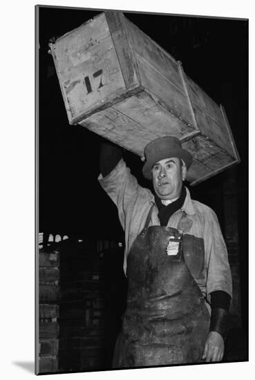 Paris Porter Wearing a Special Hard-Crowned Hat to Carry a Fish Crate, 1946-null-Mounted Photo