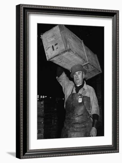 Paris Porter Wearing a Special Hard-Crowned Hat to Carry a Fish Crate, 1946-null-Framed Photo