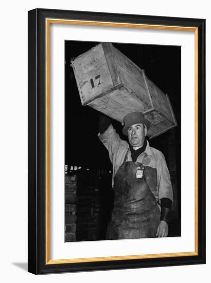 Paris Porter Wearing a Special Hard-Crowned Hat to Carry a Fish Crate, 1946-null-Framed Photo