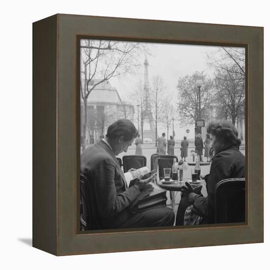 Parisian Couple Drinking Coca Cola at a Sidewalk Cafe While Reading, Paris, France, 1950-Mark Kauffman-Framed Premier Image Canvas