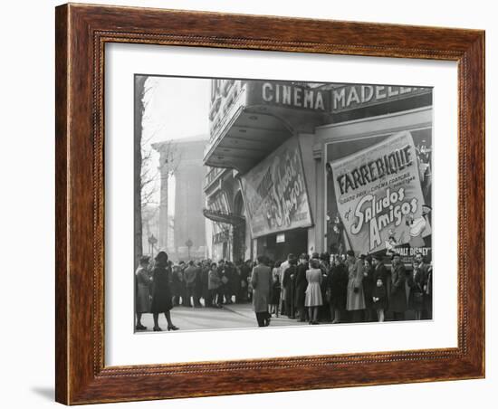 Parisiennes at a Movie Theater Showing the Disney Film, 'Saludos Amigos' in April 1947-null-Framed Premium Photographic Print