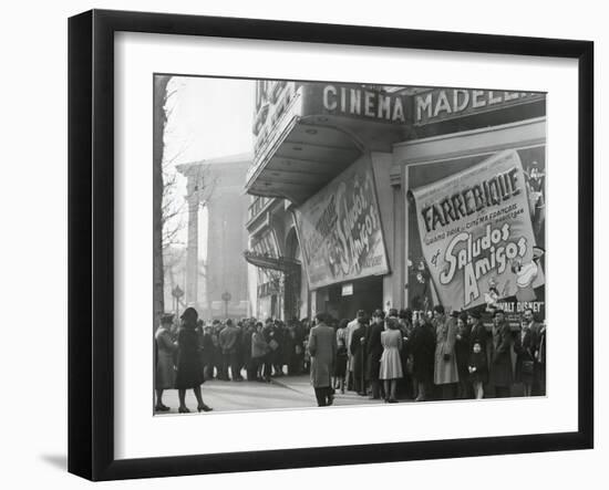 Parisiennes at a Movie Theater Showing the Disney Film, 'Saludos Amigos' in April 1947-null-Framed Premium Photographic Print