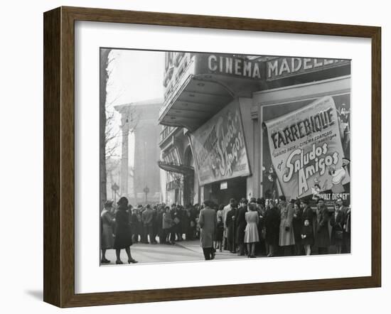 Parisiennes at a Movie Theater Showing the Disney Film, 'Saludos Amigos' in April 1947-null-Framed Photo