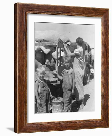 Part of an impoverished family of nine from Iowa on a New Mexico highway, 1936-Dorothea Lange-Framed Photographic Print