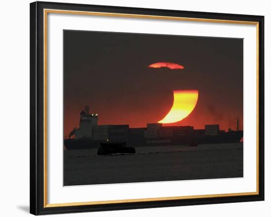 Partial Solar Eclipse as the Sun Sets at Manila's Bay, Philippines-null-Framed Photographic Print