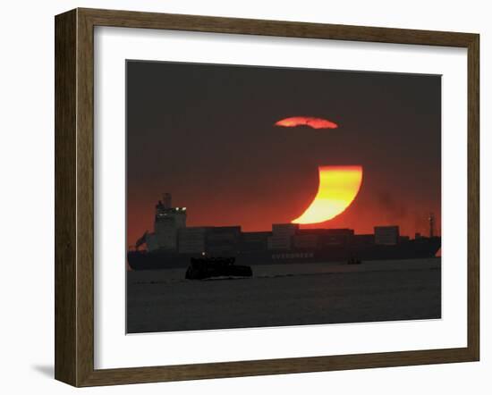Partial Solar Eclipse as the Sun Sets at Manila's Bay, Philippines-null-Framed Photographic Print