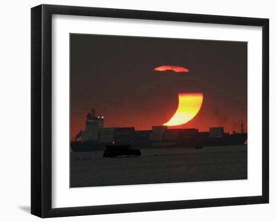 Partial Solar Eclipse as the Sun Sets at Manila's Bay, Philippines-null-Framed Photographic Print