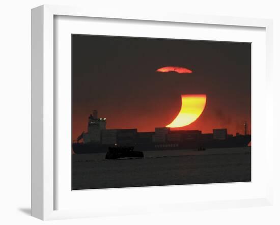 Partial Solar Eclipse as the Sun Sets at Manila's Bay, Philippines-null-Framed Photographic Print