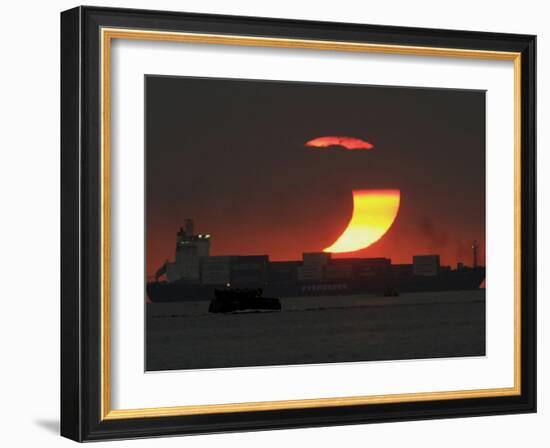 Partial Solar Eclipse as the Sun Sets at Manila's Bay, Philippines-null-Framed Photographic Print