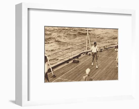 'Partners - A game of deck tennis in the Renown', 1927, (1937)-Unknown-Framed Photographic Print