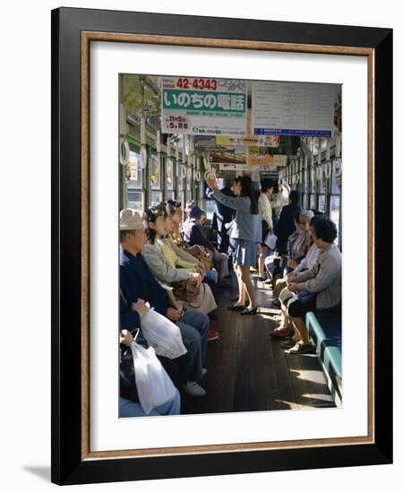 Passengers, Interior a Public Tram, Nagasaki, Island of Kyushu, Japan-Christopher Rennie-Framed Photographic Print