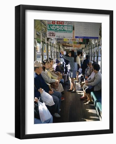 Passengers, Interior a Public Tram, Nagasaki, Island of Kyushu, Japan-Christopher Rennie-Framed Photographic Print