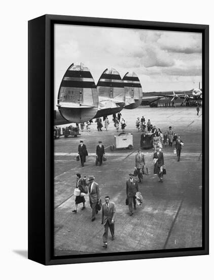 Passengers Leaving a Twa Flight at the Airport-Peter Stackpole-Framed Premier Image Canvas