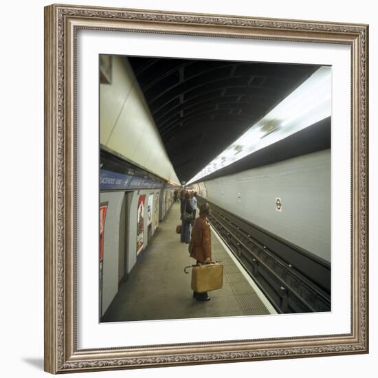 Passengers Waiting at Blackhorse Tube Station on the Victoria Line, London, 1974-Michael Walters-Framed Photographic Print