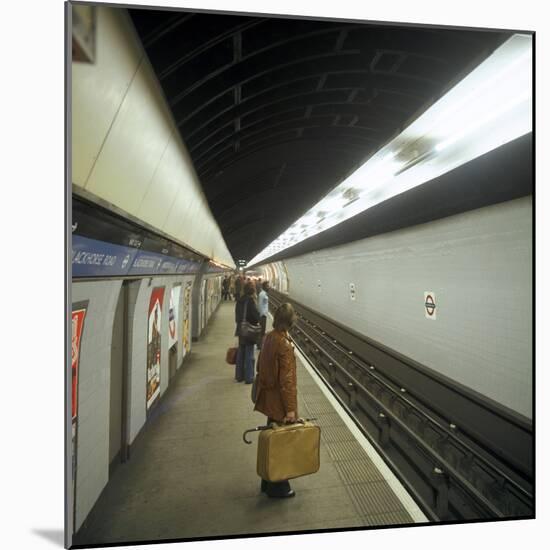 Passengers Waiting at Blackhorse Tube Station on the Victoria Line, London, 1974-Michael Walters-Mounted Photographic Print