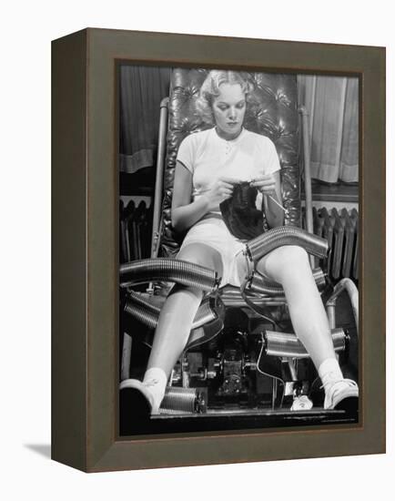 Pat Ogden at Slenderizing Salon Knitting in Padded Chair While Leg Rollers Work from Thigh to Ankle-Alfred Eisenstaedt-Framed Premier Image Canvas