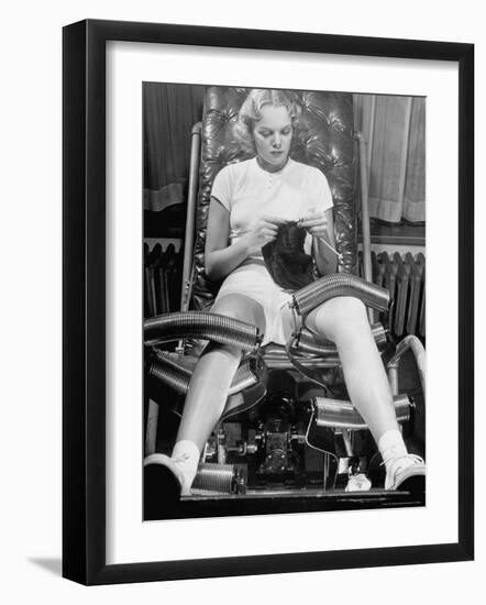 Pat Ogden at Slenderizing Salon Knitting in Padded Chair While Leg Rollers Work from Thigh to Ankle-Alfred Eisenstaedt-Framed Photographic Print