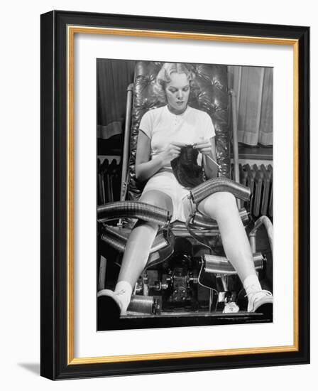 Pat Ogden at Slenderizing Salon Knitting in Padded Chair While Leg Rollers Work from Thigh to Ankle-Alfred Eisenstaedt-Framed Photographic Print