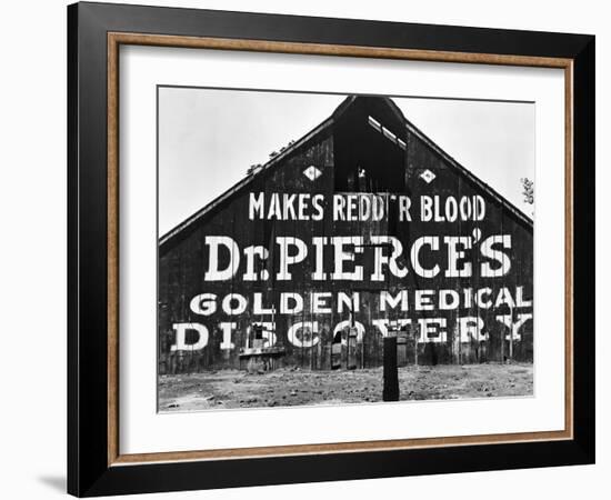 Patent Medicine Sign on A Barn-Dorothea Lange-Framed Photographic Print