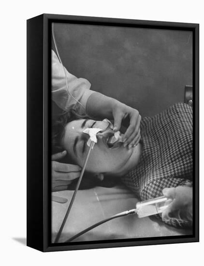 Patient Having Stomach Pumped after Poisoning by Overdose of Tranquilizers-Ralph Morse-Framed Premier Image Canvas