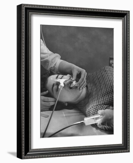 Patient Having Stomach Pumped after Poisoning by Overdose of Tranquilizers-Ralph Morse-Framed Photographic Print