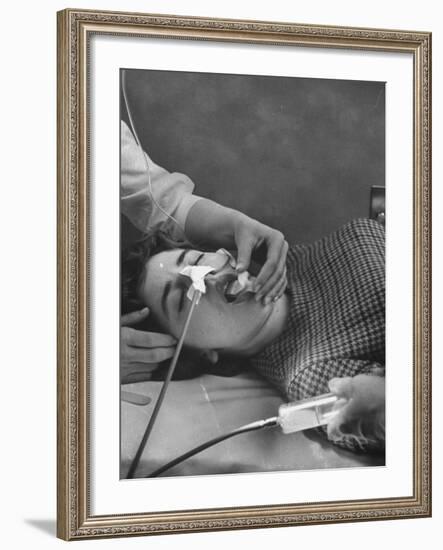 Patient Having Stomach Pumped after Poisoning by Overdose of Tranquilizers-Ralph Morse-Framed Photographic Print