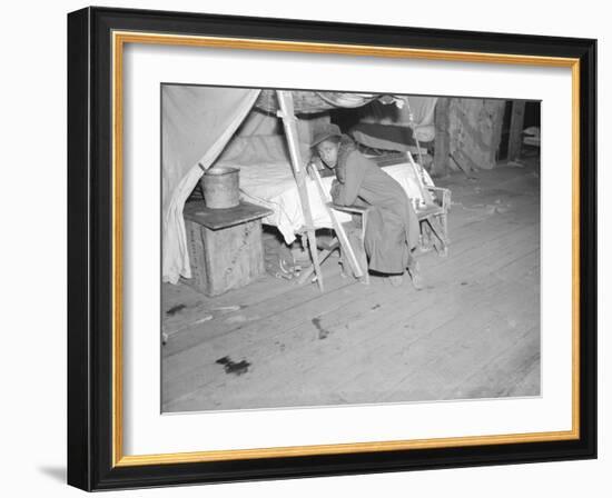 Patient in a Red Cross temporary infirmary for flood refugees at Forrest City, Arkansas, 1937-Walker Evans-Framed Photographic Print