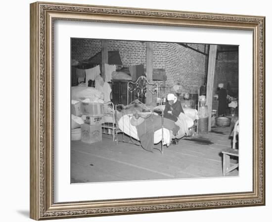 Patient in a Red Cross temporary infirmary for flood refugees at Forrest City, Arkansas, 1937-Walker Evans-Framed Photographic Print