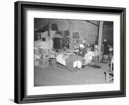 Patient in a Red Cross temporary infirmary for flood refugees at Forrest City, Arkansas, 1937-Walker Evans-Framed Photographic Print