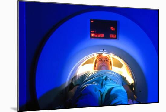 Patient Passes Into a CT Scanner-Volker Steger-Mounted Photographic Print