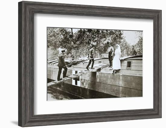 Patients being taken on board a hospital barge, Somme campaign, France, World War I, 1916-Unknown-Framed Photographic Print