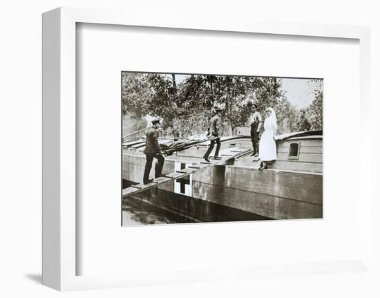 Patients being taken on board a hospital barge, Somme campaign, France, World War I, 1916-Unknown-Framed Photographic Print