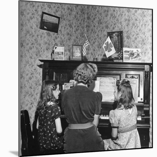 Patricia Colleen Altree Playing the Piano with Her Two Sisters-J^ R^ Eyerman-Mounted Photographic Print