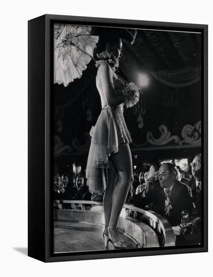 Patron at Stage-Side Table Looks Appraisingly at Tall Show Girl Standing at Edge of Stage-Gjon Mili-Framed Premier Image Canvas