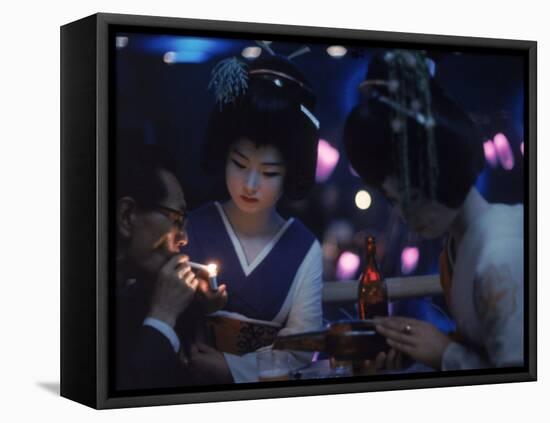 Patron of Nightclub Uruwashi Having His Cigarette Lit by Geisha-Eliot Elisofon-Framed Premier Image Canvas