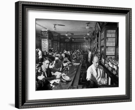 Patrons Enjoying Drinks at Sloppy Joe's Bar-Eliot Elisofon-Framed Photographic Print