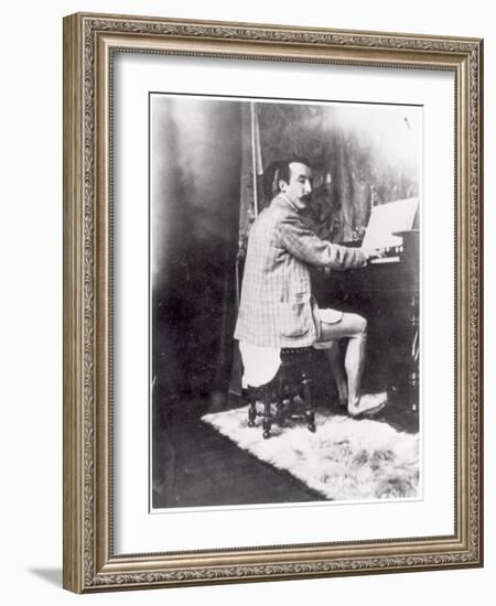 Paul Gauguin (1848-1903) Playing the Harmonium in Mucha's Studio, c.1895-Alphonse Mucha-Framed Photographic Print