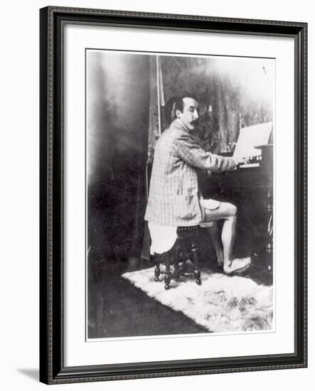 Paul Gauguin (1848-1903) Playing the Harmonium in Mucha's Studio, c.1895-Alphonse Mucha-Framed Photographic Print