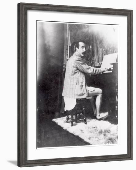 Paul Gauguin (1848-1903) Playing the Harmonium in Mucha's Studio, c.1895-Alphonse Mucha-Framed Photographic Print