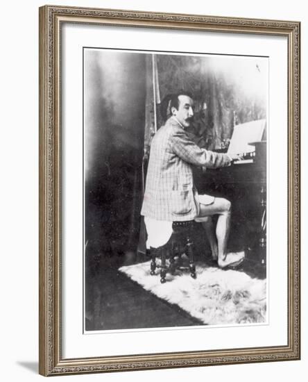 Paul Gauguin (1848-1903) Playing the Harmonium in Mucha's Studio, c.1895-Alphonse Mucha-Framed Photographic Print