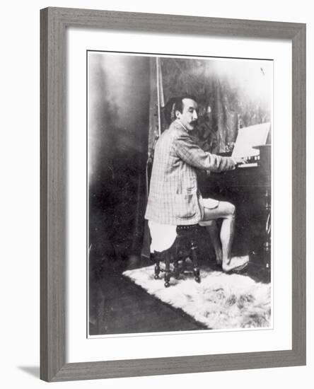 Paul Gauguin (1848-1903) Playing the Harmonium in Mucha's Studio, c.1895-Alphonse Mucha-Framed Photographic Print