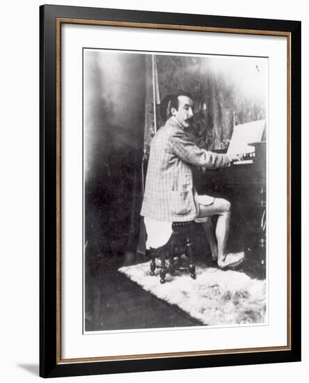 Paul Gauguin (1848-1903) Playing the Harmonium in Mucha's Studio, c.1895-Alphonse Mucha-Framed Photographic Print