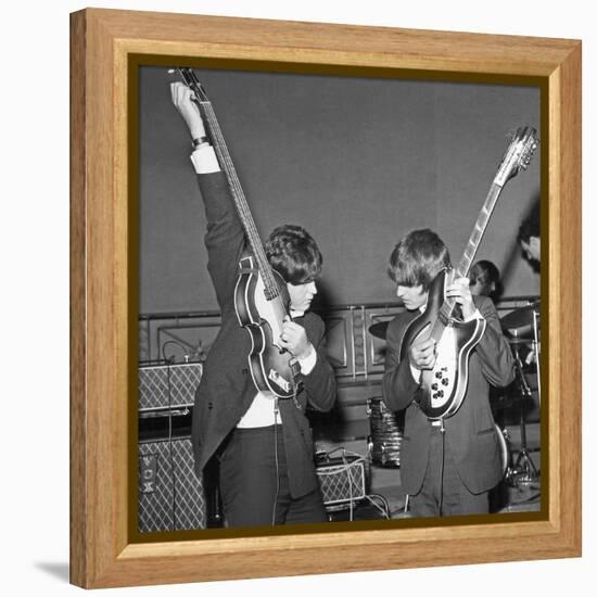 Paul Mccartney and George Harrison Tune their Guitars-Associated Newspapers-Framed Stretched Canvas