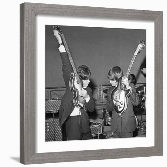 Paul Mccartney and George Harrison Tune their Guitars-Associated Newspapers-Framed Photo